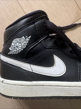 Air Jordan 1 Retro Mid Black and White Panda Sneakers